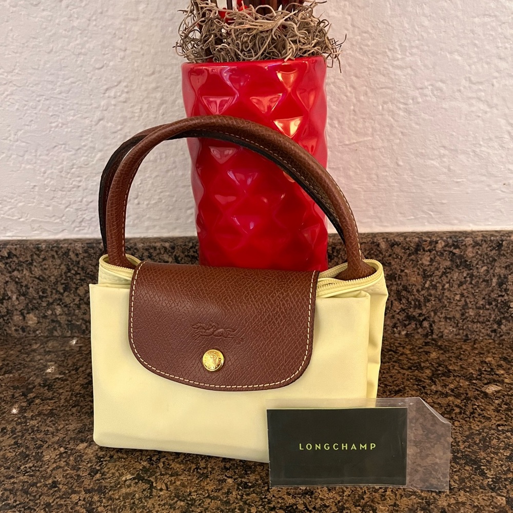 Longchamp Medium Le Pliage Top Handle Folding Bag.